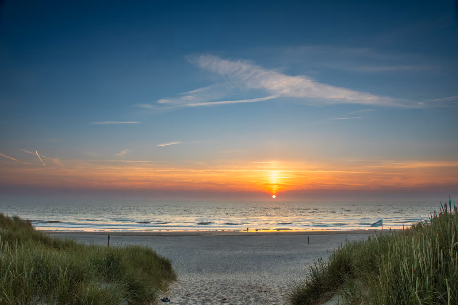 Zonsondergang bij duinen