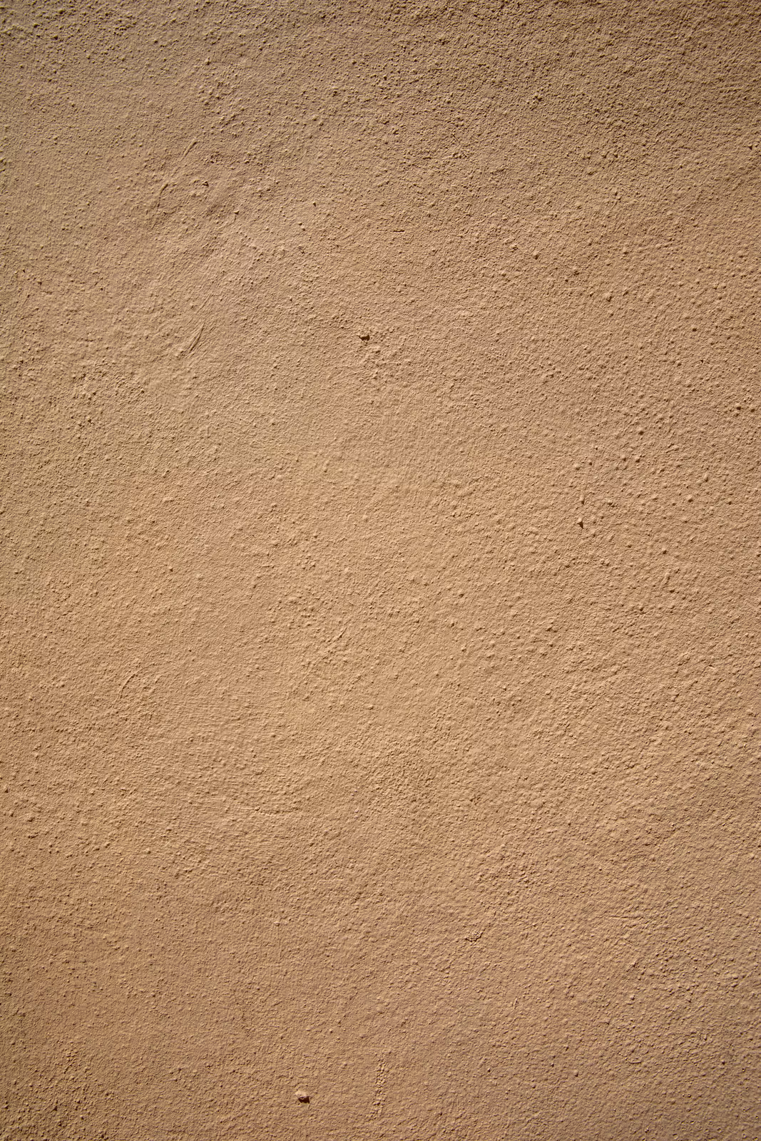 Beige stucmuur